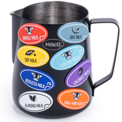 Compact 32oz (900ml) black pitcher with attached color-coded labels for quick milk identification in coffee shops and home kitchens.